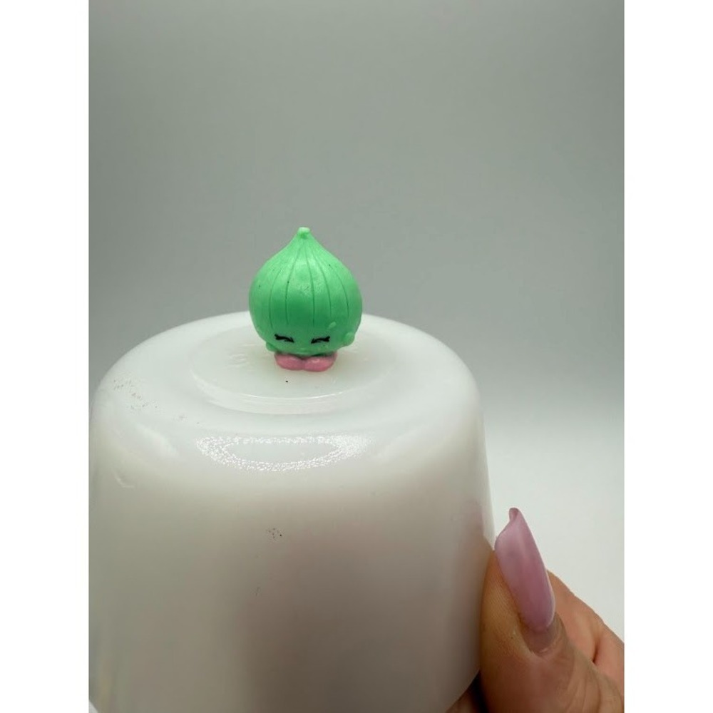 Shopkins Season 2 Boo-Hoo Onion figure in a mint green color